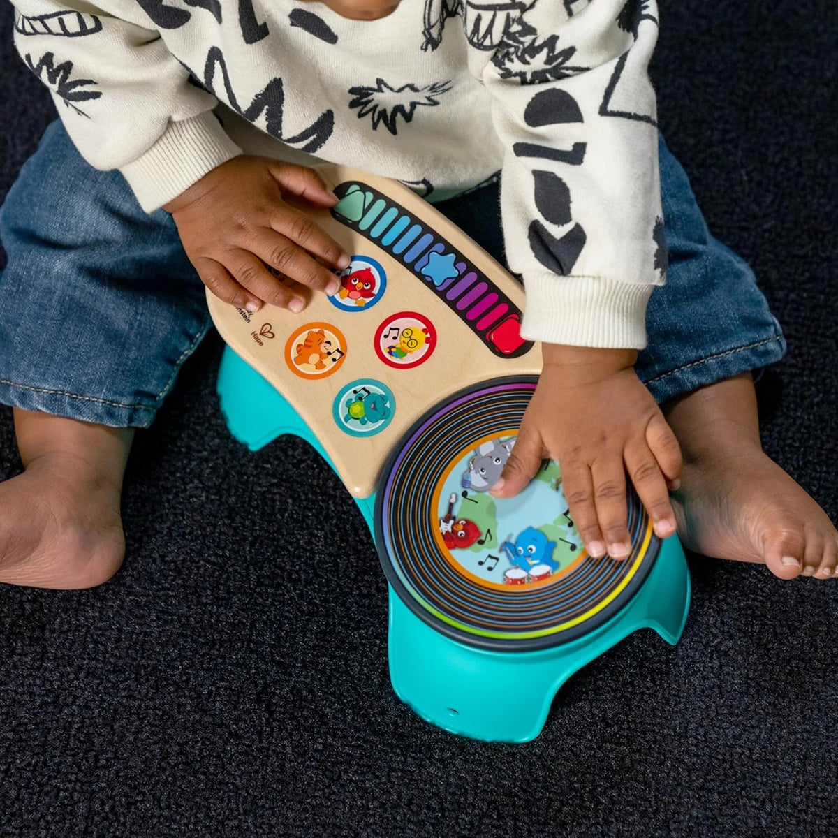 BABY EINSTEIN DJ Discovery consolă tactilă din lemn cu 50 de melodii și sunete