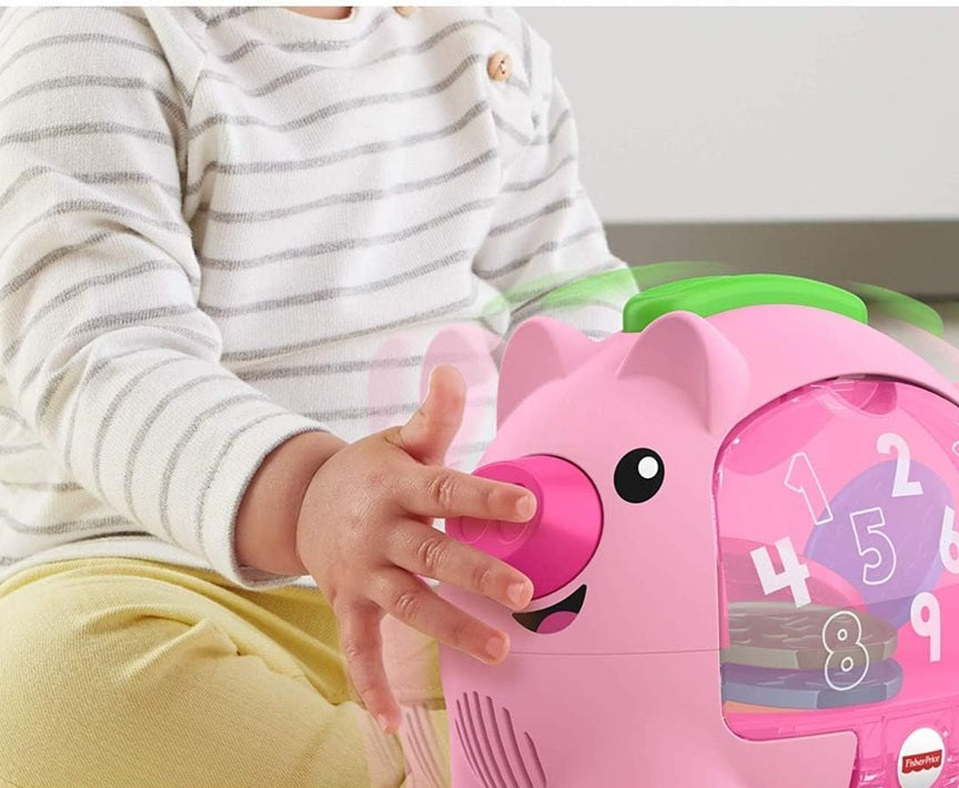 FISHER-PRICE cerdito hucha interactivo movimiento y sonidos J. INGLÉS
