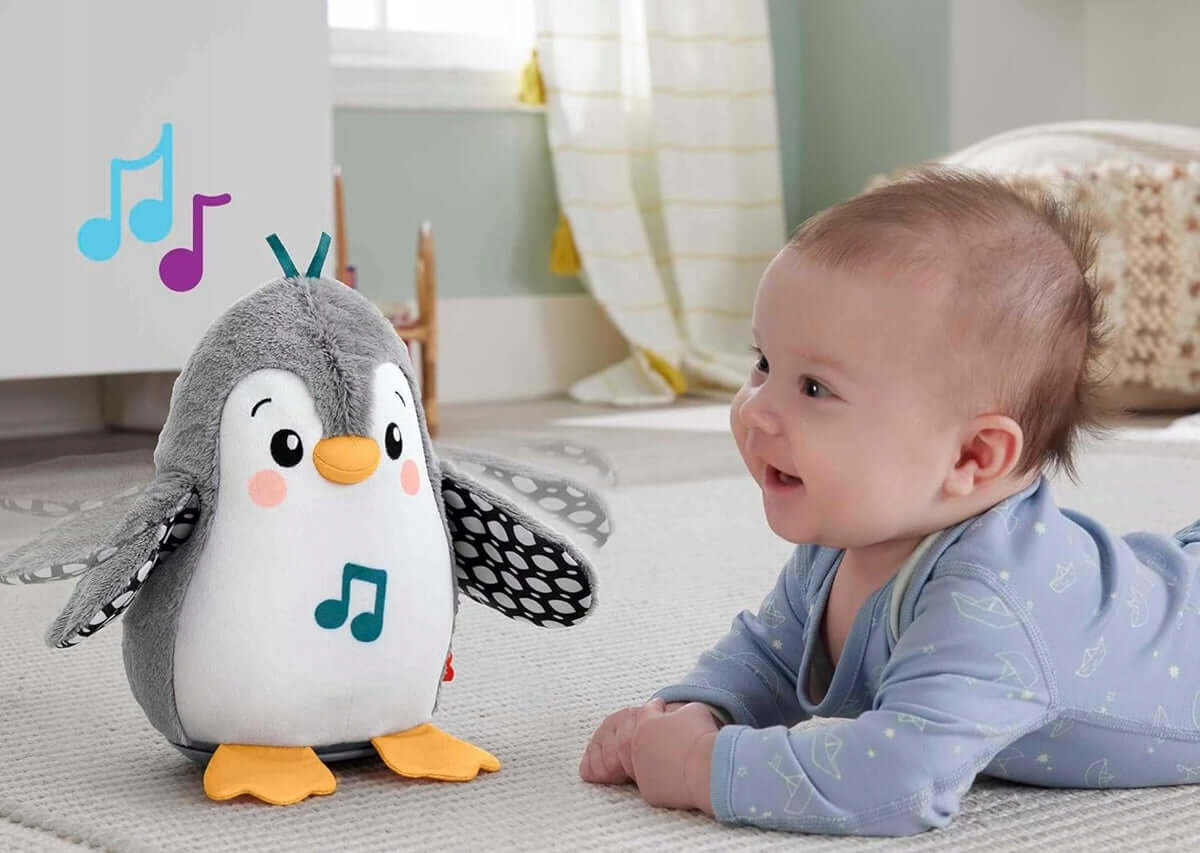 FISHER-PRICE HNC10 kiwający się pingwin z melodiami 21 cm