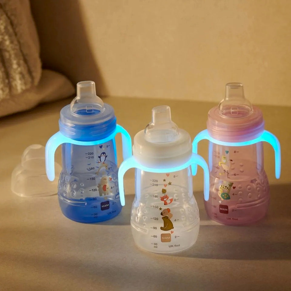 MAM Trainer Night vaso antigoteo 2 boquillas y asas luminosas 220 ml 4 m+