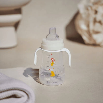 MAM Trainer Night vaso antigoteo 2 boquillas y asas luminosas 220 ml 4 m+