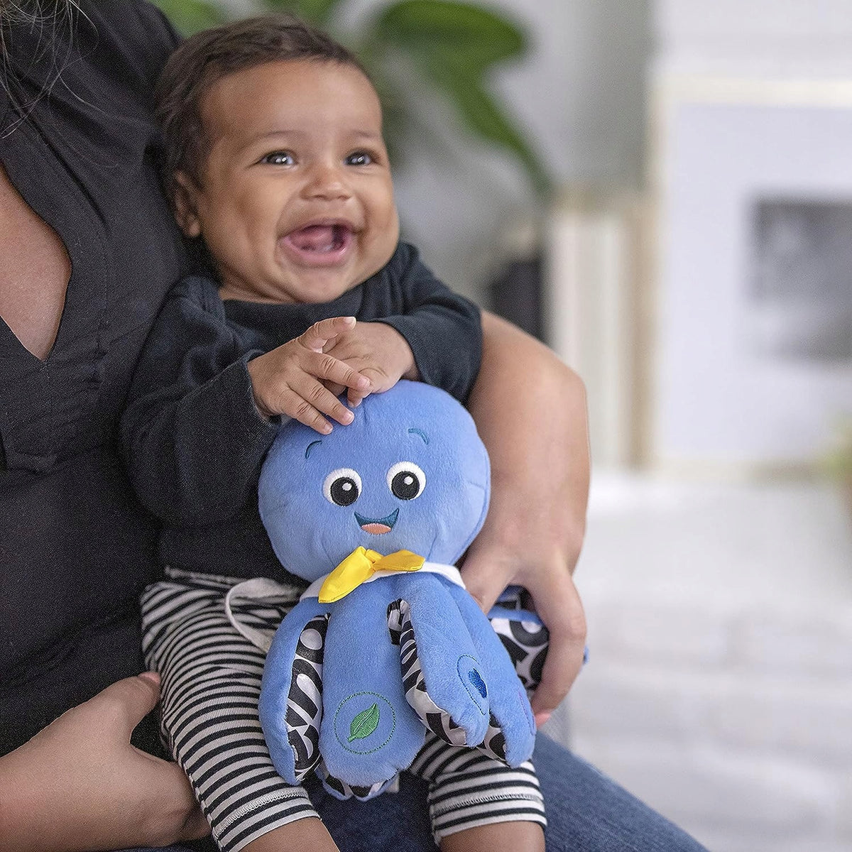 BABY EINSTEIN muzyczna ośmiornica J. ANG FRA HISZ. niebieska zabawka edukacyjna dla dzieci 3m+