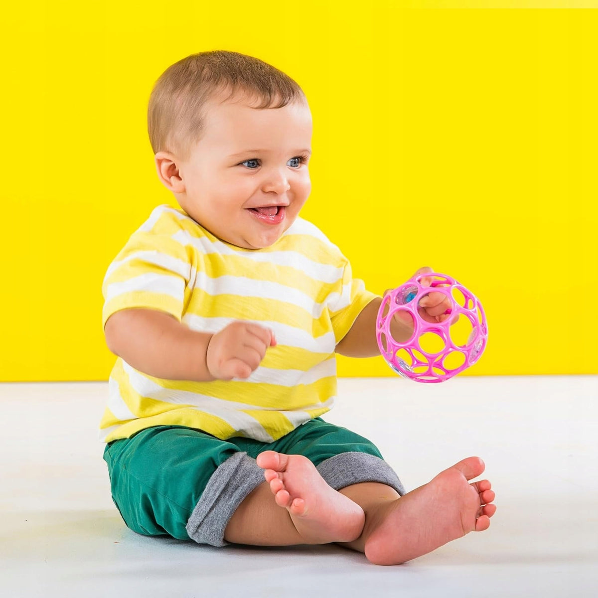 BRIGHT STARTS Oball Rattle Σιλικονούχο παιχνίδι οδοντοφυΐας με κρίκους δαγκώματος και κουδουνίστρα 10 εκ.