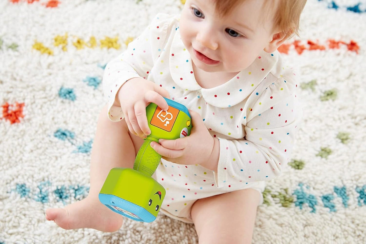 FISHER-PRICE interaktywny hantel grzechotka dźwięki światło J. NIEMIECKI, zielona zabawka dla niemowląt