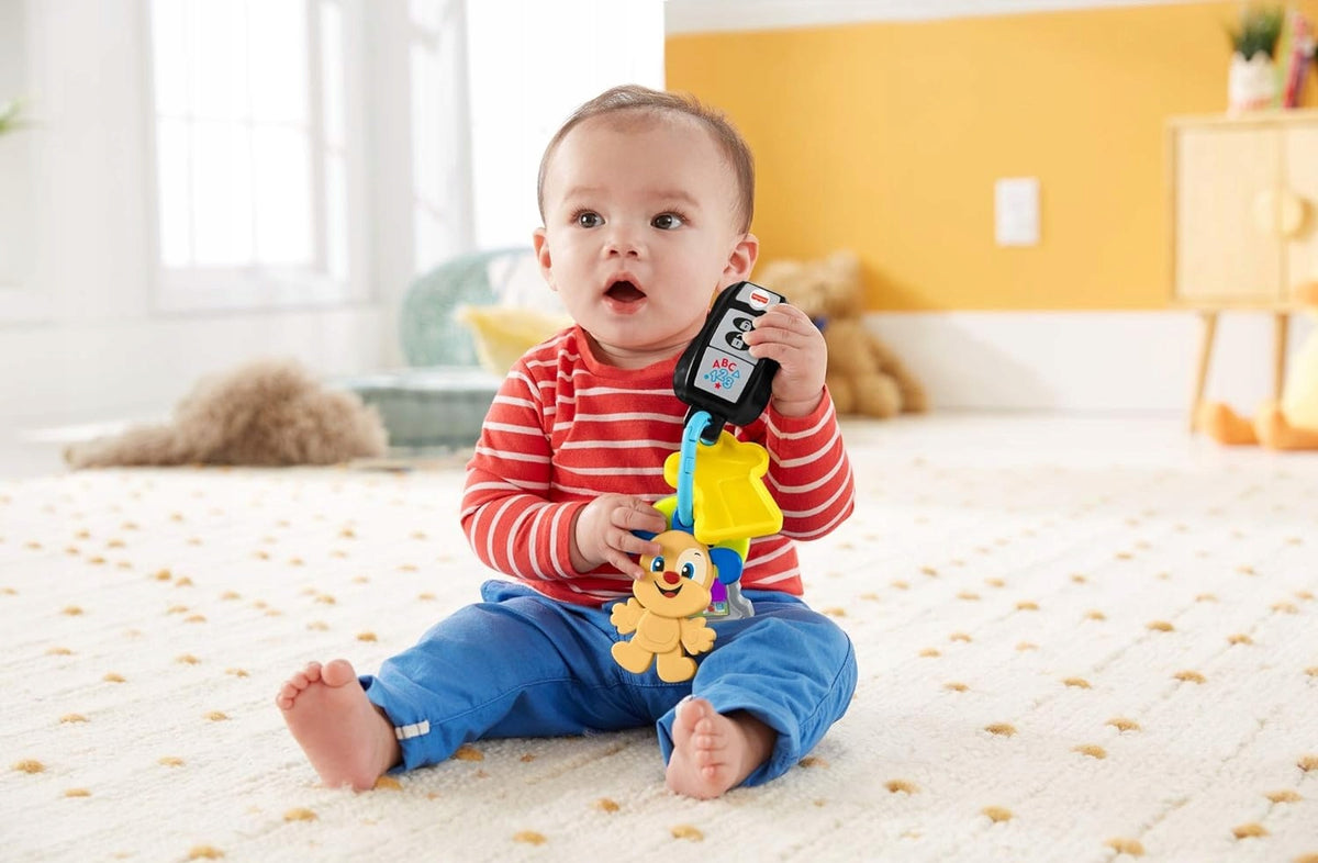 FISHER-PRICE interaktywne kluczyki samochodowe z brelokiem J. NIEMIECKI dla niemowląt 6 m+, muzyka i światełko